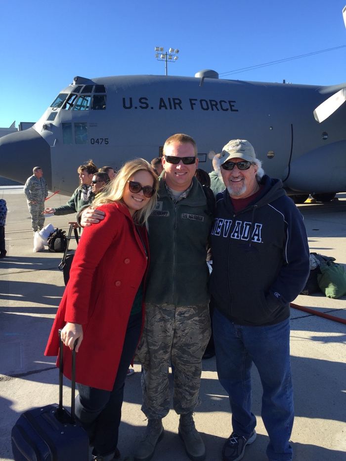 Mike Faulkenberry with family in front of a U.S. Air Force C-130 during his military service
